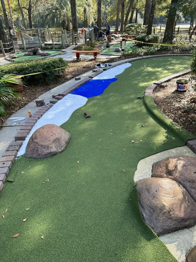 Mini golf course wooded park setting