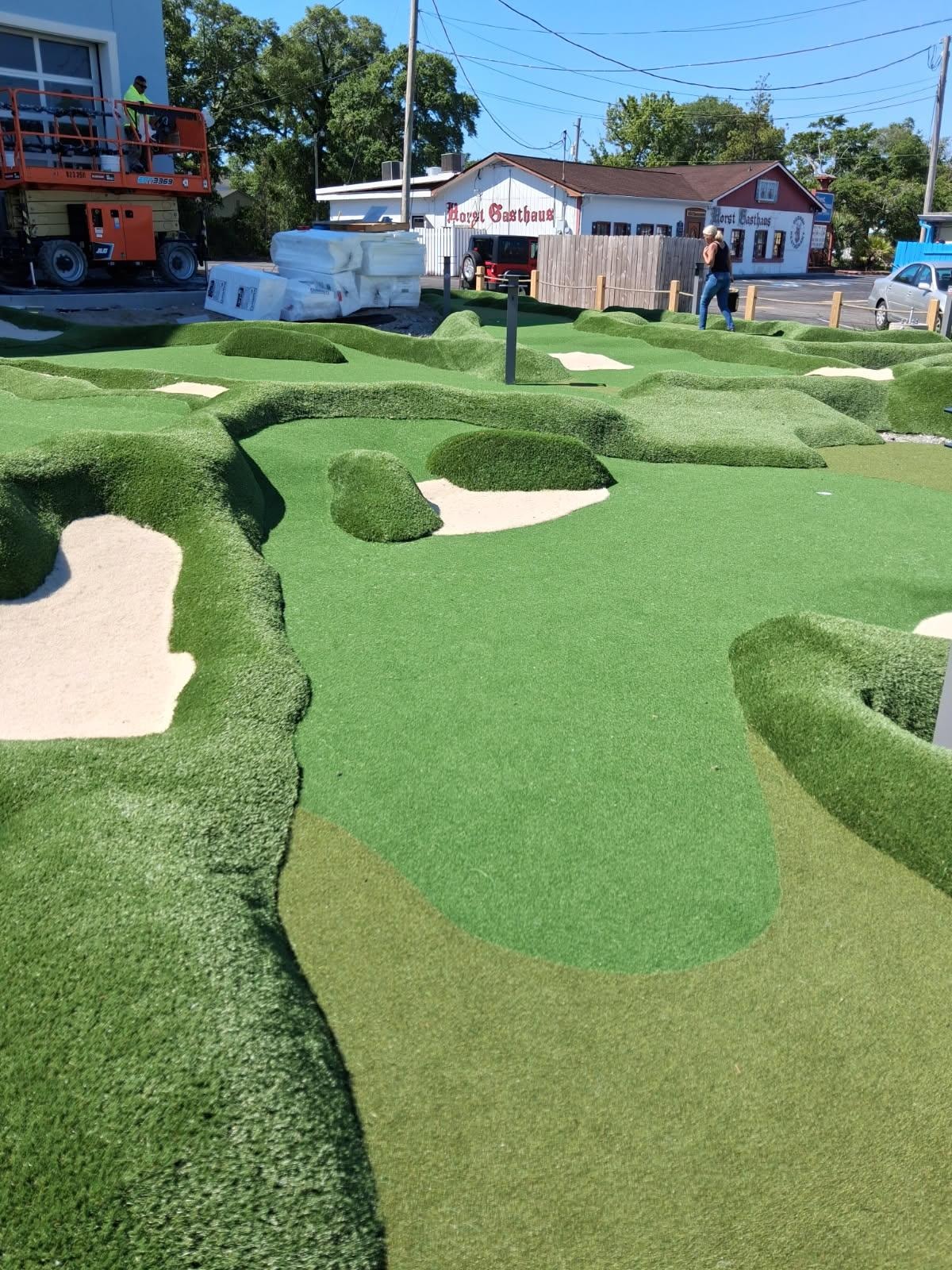 Miniature golf course with sand bunkers