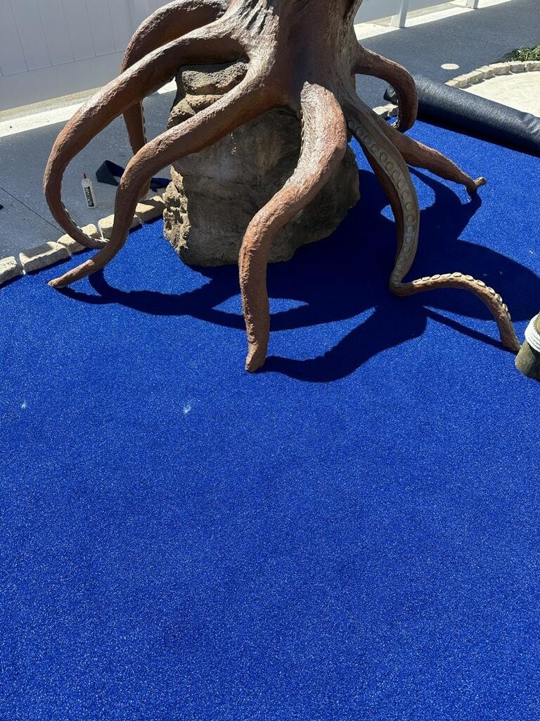 Giant octopus sculpture at mini golf course