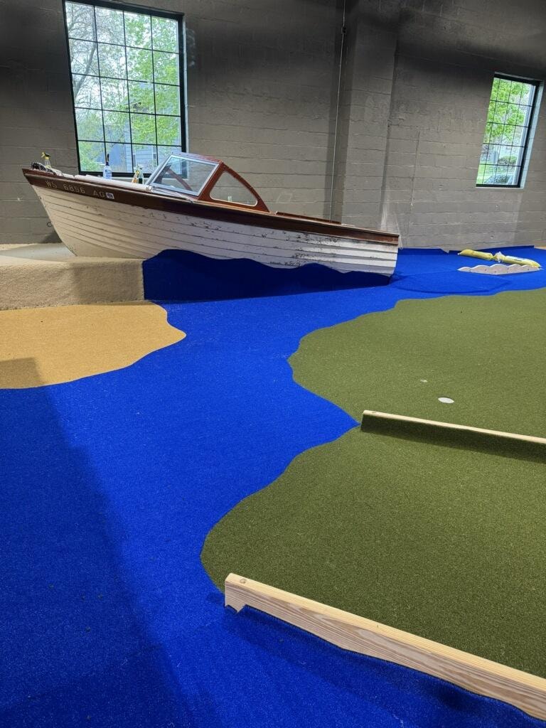 Vintage boat indoor mini golf course